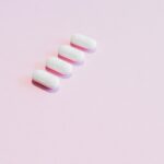 pills on a pink surface